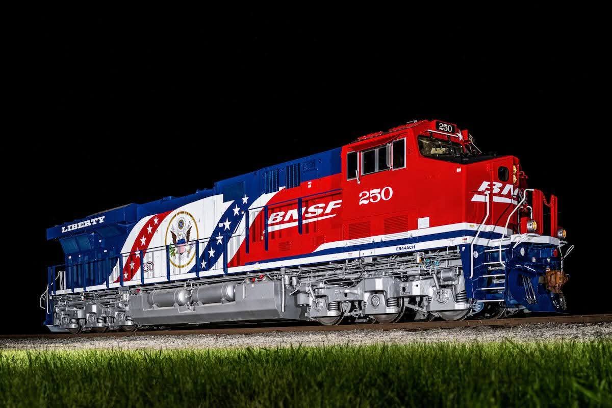 BNSF 250 in America 250 livery with the Great Seal, lit against a night sky